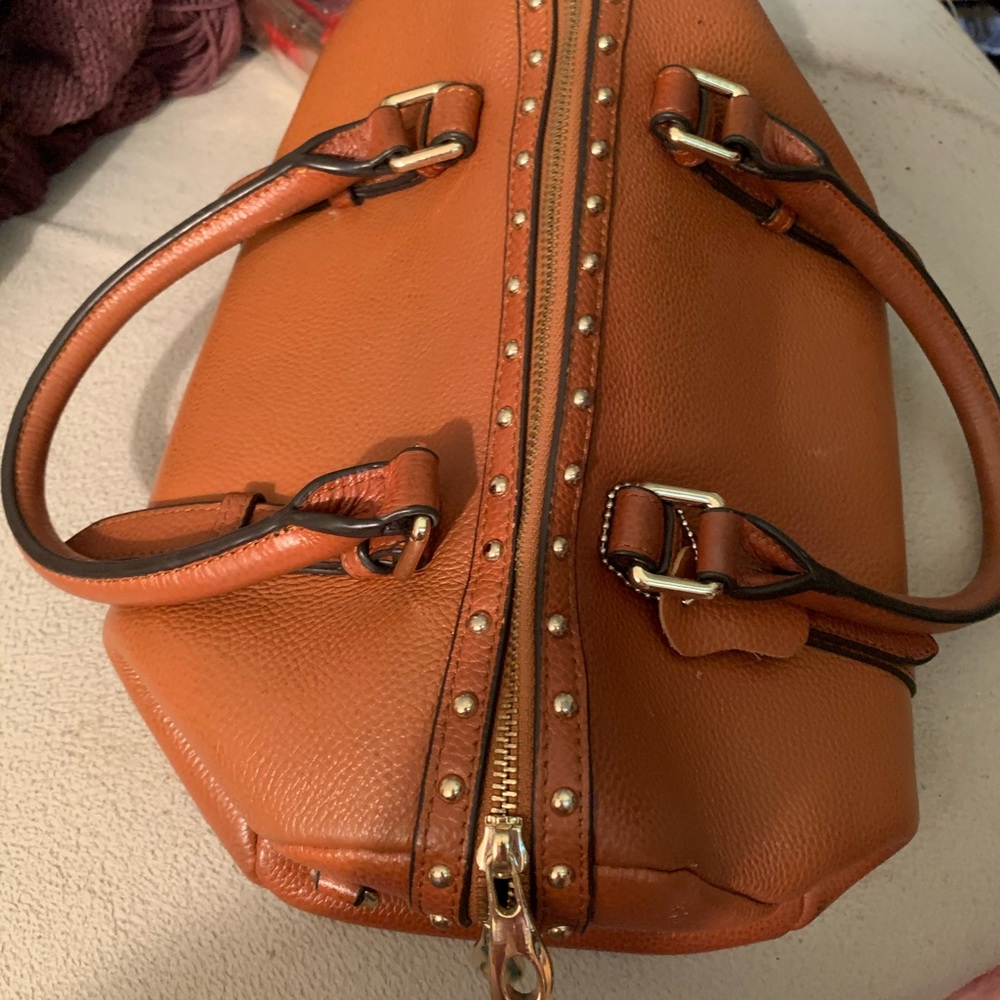 This is brown leather dr bag like purse
